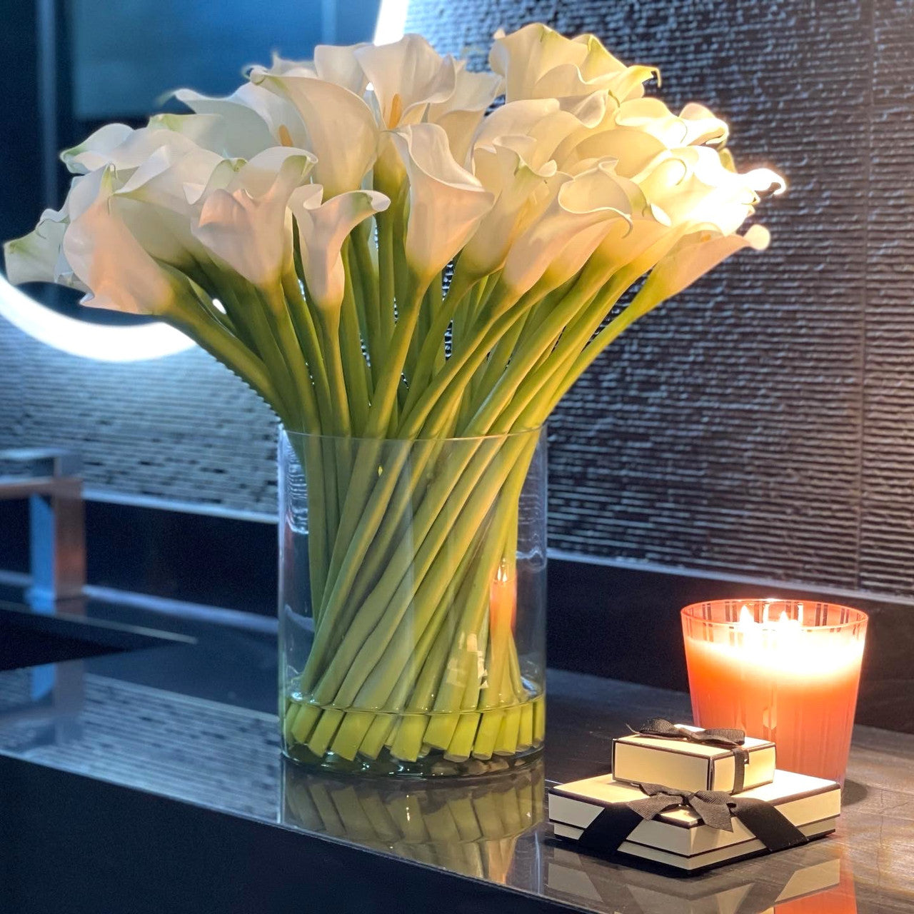 Calla Lilies in Glass Cylinder 10″
