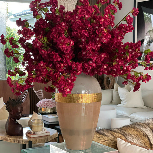 "Goddess" vase with burgundy cherry blossoms